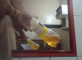 Pissing in a bottle