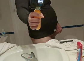 Big belly person in spandex shirt spasmodical off infront of mirror cumming on the floor