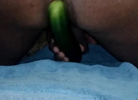 Yawning chasm fucking with a cucumber