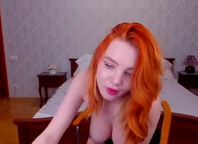 Ginger babe spanks nice tits increased by fingers ass