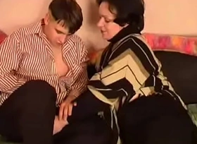 russian old woman with an increment of son fat