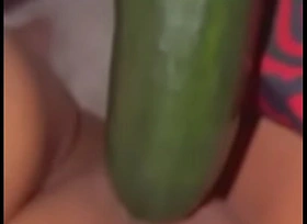 Wife fucks her pussy with cucumber