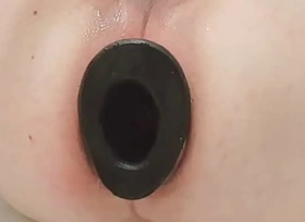 Casey uses 19inch dildo and pighole to hollow overseas chasm