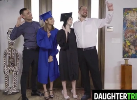 Dads flourish their graduating daughters