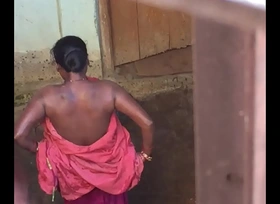 Desi village horny bhabhi exposed bath show caught by hidden cam