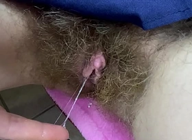 Nasty Hairy Pussy Huge erected Clitoris drenched close up berating