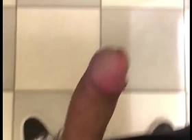 Asian guy jerking off connected with mall restroom