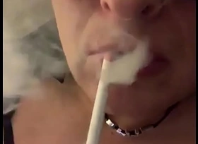 Cd Nikki erotic smoking with left-hand lipstick and dangles