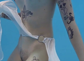 Cutest tattooed teen Mimi swimming naked