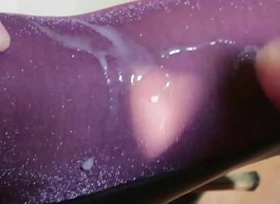Nylon cumshot on lurex purple pantyhose feet